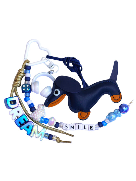 grigri de sac chien - bleu blanc doré